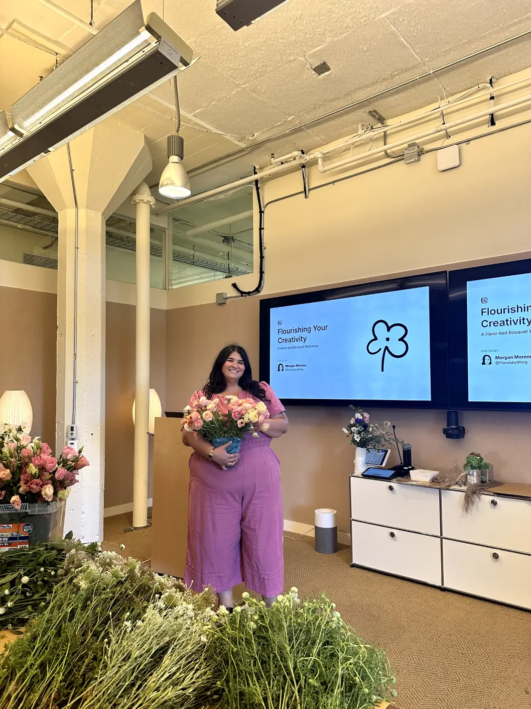 Morgan Moreno, Employer Branding Program Manager, leading a session on floral design